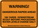 8.03.06A  WARNING!  DANGEROUS RAPIDS AHEAD  100 YARDS DOWNSTREAM SCOUT BEFORE PROCEEDING WATER ...