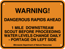 8.03.06B  WARNING!  DANGEROUS RAPIDS AHEAD  1 MILE DOWNSTREAM SCOUT BEFORE PROCEEDING WATER LEVELS .