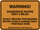8.03.06C  WARNING!  DANGEROUS RAPIDS NEXT 2 MILES  SCOUT BEFORE PROCEEDING WATER LEVELS CHANGE DAILY