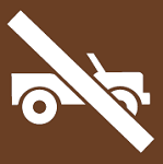 8.04.22DX  [no O.R.V. Off-road vehicle - trail use symbol] 3"x3" decal brown/white